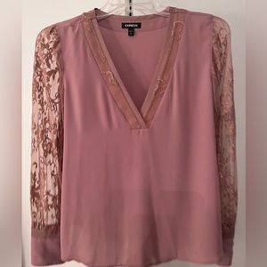 New without tags. Express lace sleeve blouse size large. Maybe color.